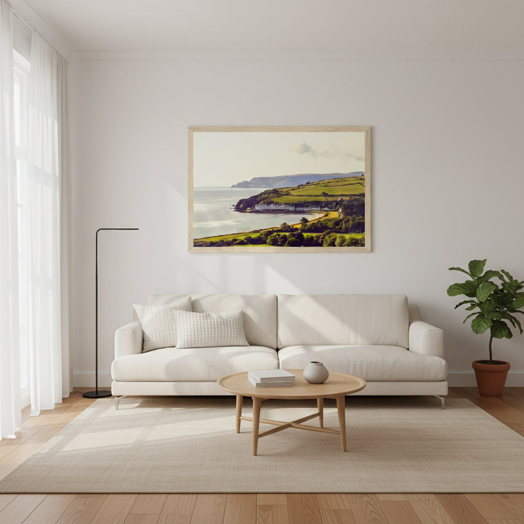 60×90 cm Cushendun landscape print centred on a white wall in a modern living room with oak flooring and neutral furnishings.