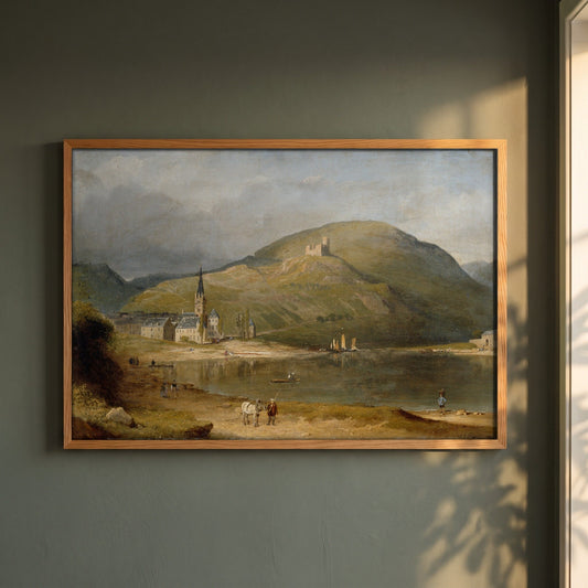 Bernkastel on the Moselle framed print in a natural oak frame on a dark green wall beside a window, dappled plant shadow