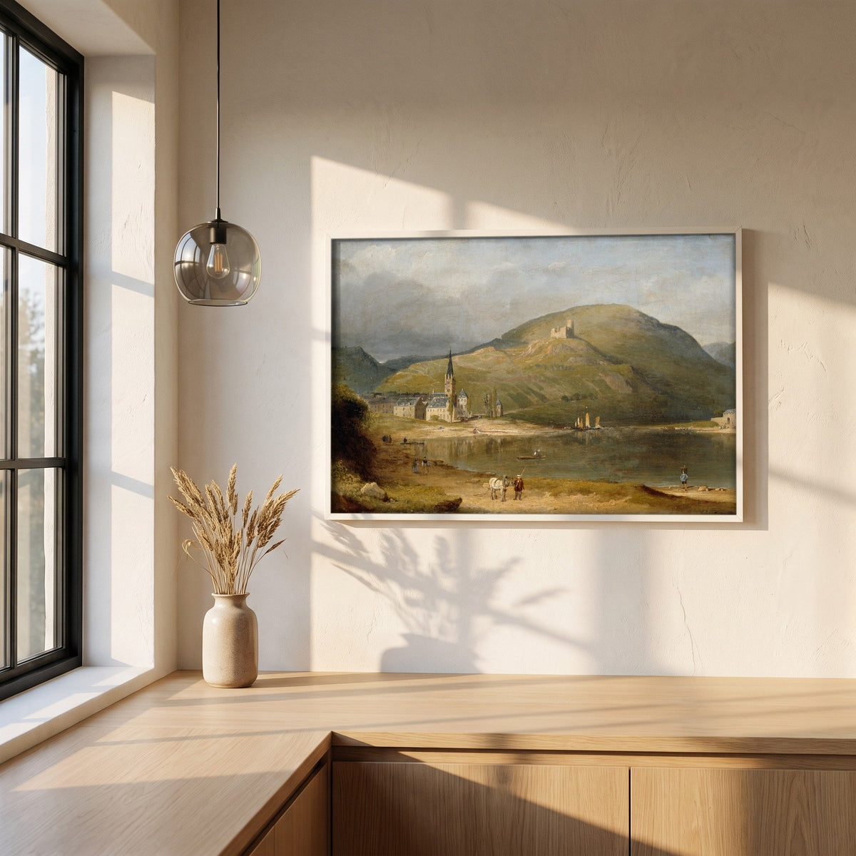 Bernkastel on the Moselle framed print in a white frame on a plaster wall above an oak worktop in a bright Scandinavian kitchen