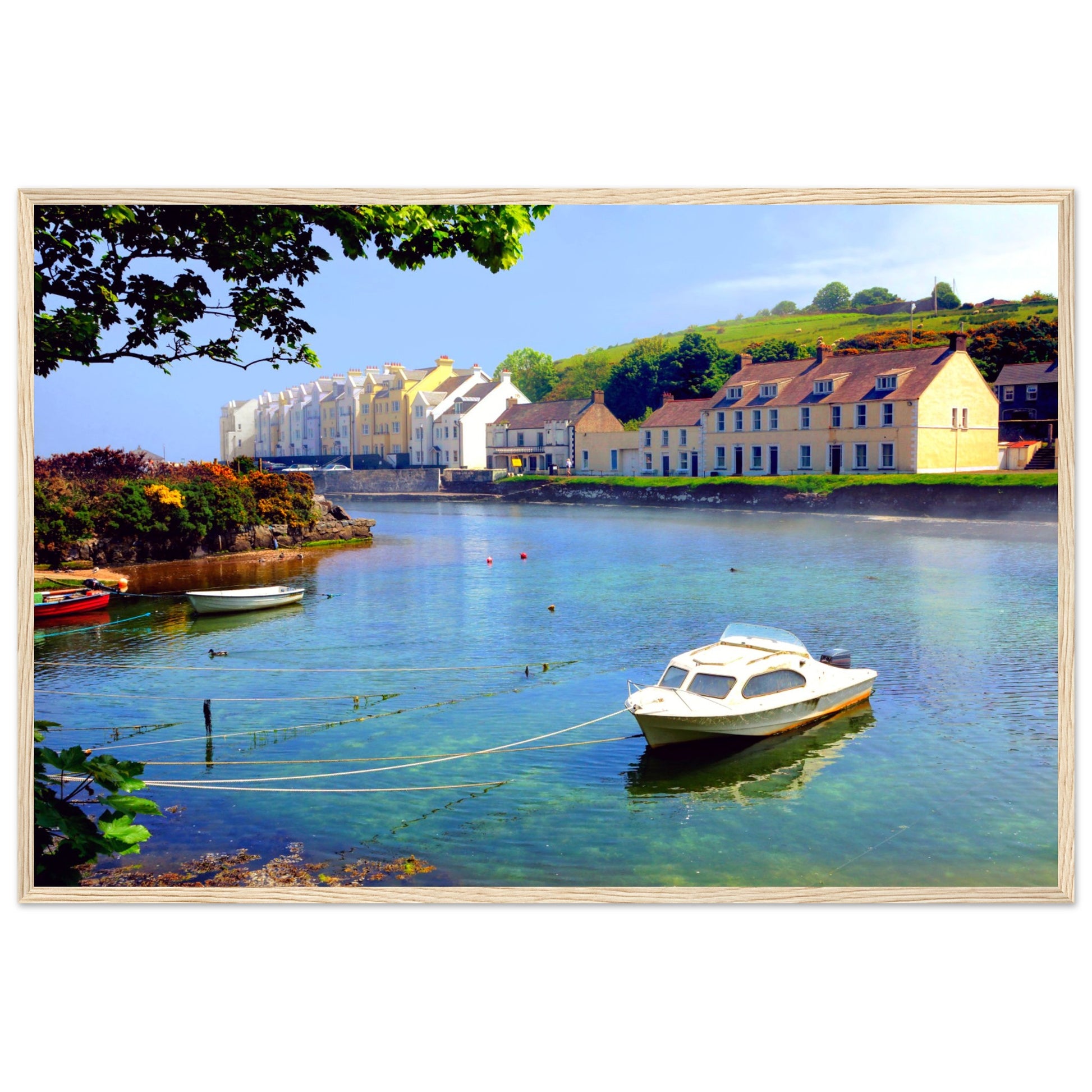 Serene coastal view of Cushendun, Northern Ireland at sunrise. Rustic wooden frame complements natural tones.