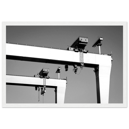 Framed wall art print featuring a detailed historical image of the Harland & Wolff shipyard, known for constructing the RMS Titanic. Perfect for maritime enthusiasts, this vintage-style decor piece captures the essence of shipbuilding heritage and industrial history.