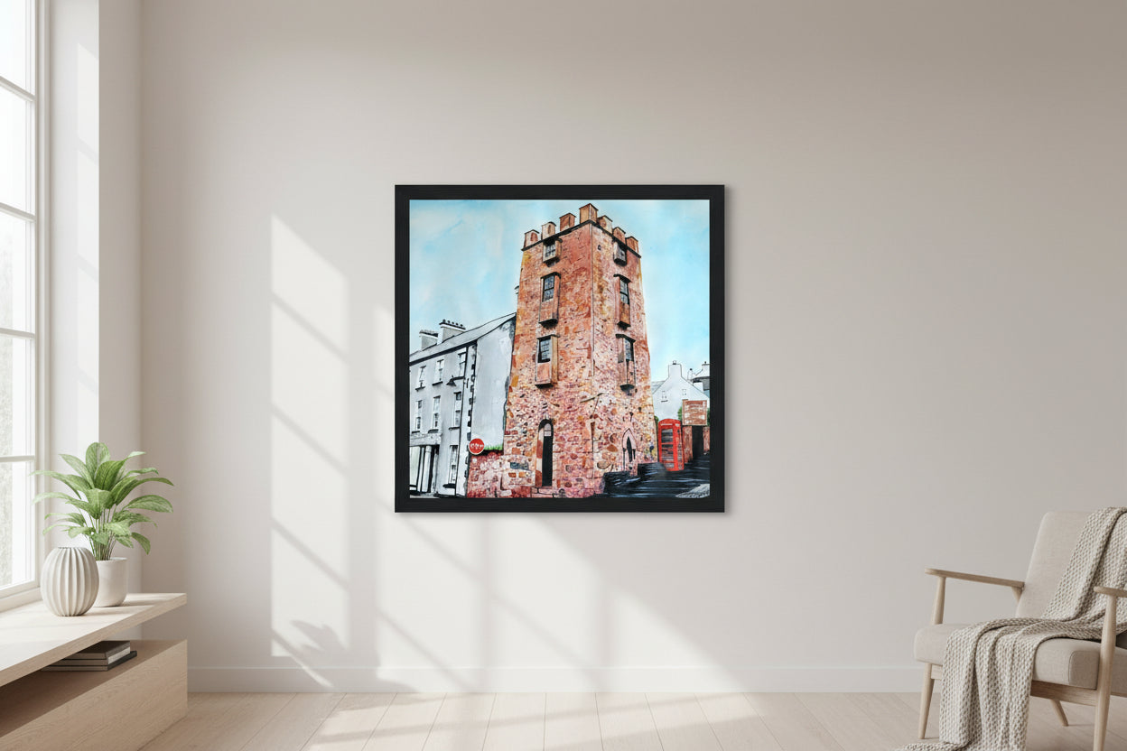 30×30 cm black-framed square art print of The Curfew Tower Cushendall hanging on a soft-neutral wall, modern minimalist living room, natural light, subtle shadows, clean Scandinavian décor, crisp frame detail, premium editorial home-styling photography. Framed art print 'The Curfew Tower' by Ó Maoláin. This piece depicts The Curfew Tower in Cushendall, Glens of Antrim, built by Francis Turnley in 1820 and now owned by Bill Drummond. The artwork showcases the tower amid the scenic Glens of Antrim.