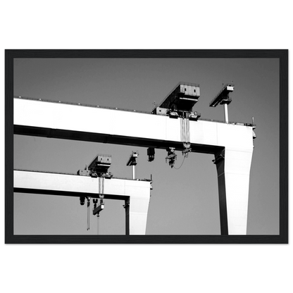 Framed wall art print featuring a detailed historical image of the Harland & Wolff shipyard, known for constructing the RMS Titanic. Perfect for maritime enthusiasts, this vintage-style decor piece captures the essence of shipbuilding heritage and industrial history.