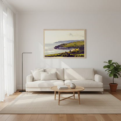 60×90 cm Cushendun landscape print centred on a white wall in a modern living room with oak flooring and neutral furnishings.
