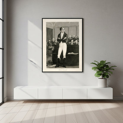 Framed Robert Emmet trial print styled in a minimalist modern home interior. Soft grey wall, black wood frame, clean furniture lines, a hint of greenery from a potted plant. Gentle side lighting highlights the engraving detail — luxury lifestyle photography aesthetic.