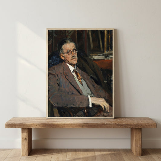 James Joyce portrait in a natural wood frame leaning against an off-white wall on a rustic wooden shelf, subtle warm light, soft shadow falloff, neutral interior styling, premium fine art emphasis.