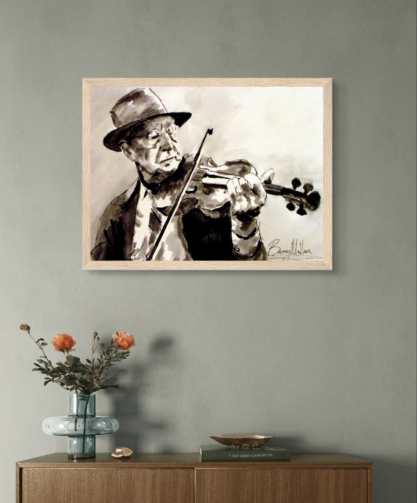 Framed art print of an old Irish traditional fiddle player by artist B. Mullan. The musician is depicted in a nostalgic, rustic setting, evoking the soulful melodies and rich cultural heritage of Ireland. Ideal for music lovers and enthusiasts of Irish tradition.