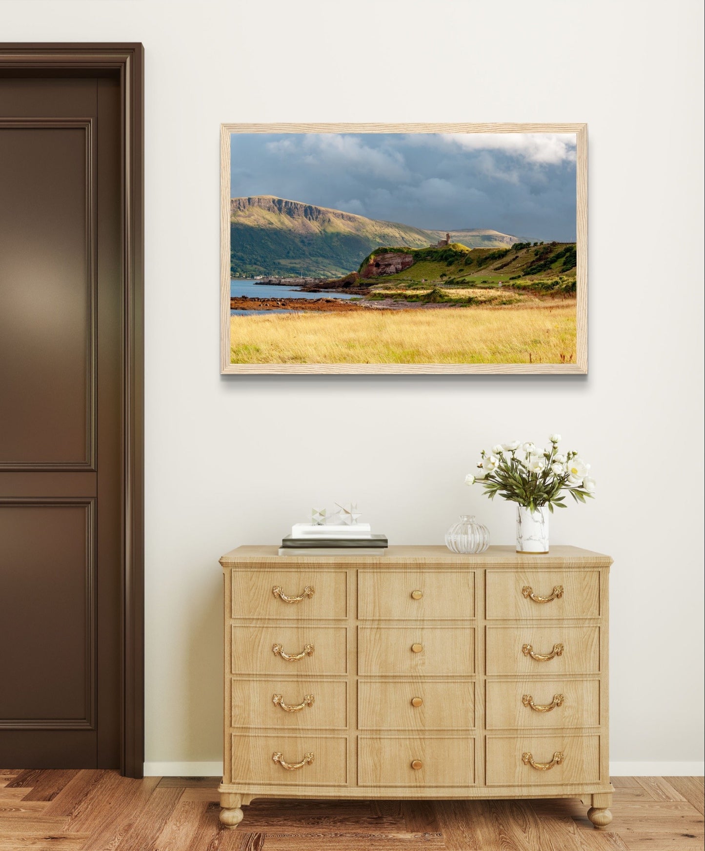 A framed print featuring Red Bay Castle against cliffs in County Antrim, capturing rugged coastal beauty and medieval history.