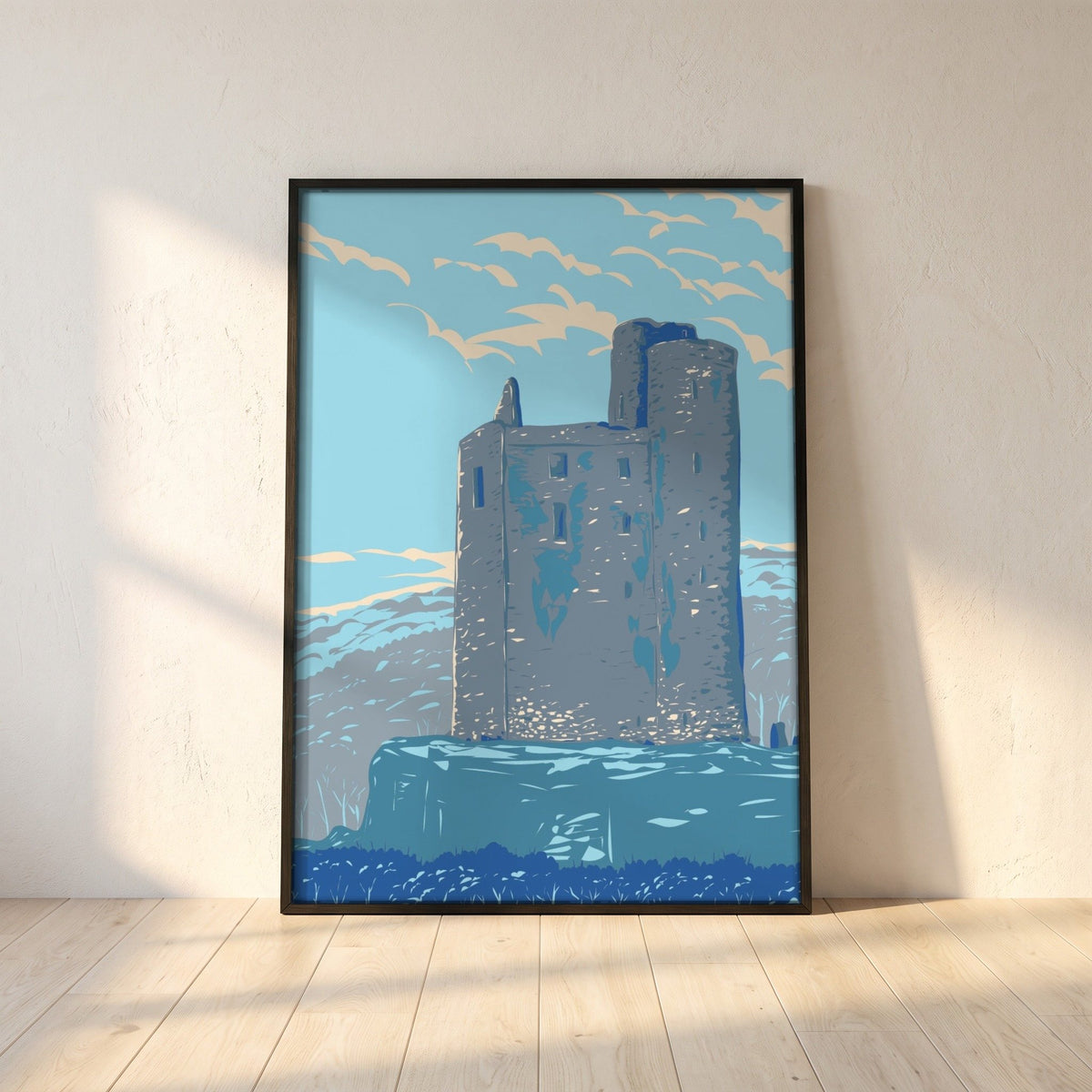 Ballinalacken Castle, County Clare retro travel print in a black frame leaning against a white plaster wall on oak floorboards in morning light