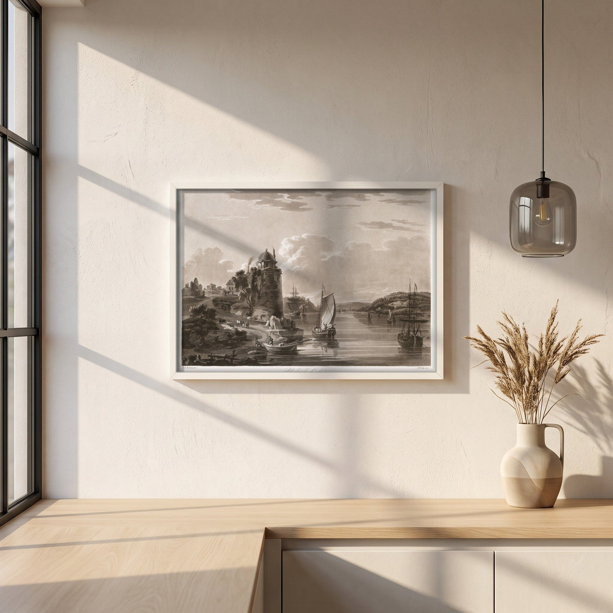 Blackrock Castle 1796 by Thomas Sautelle Roberts Art Print framed print in a white frame on a plaster wall above an oak worktop in a bright Scandinavian kitchen