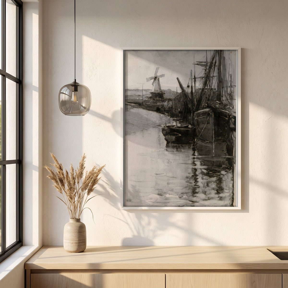 Boats in Rye Harbour, Sussex framed print in a white frame on a plaster wall above an oak worktop in a bright Scandinavian kitchen