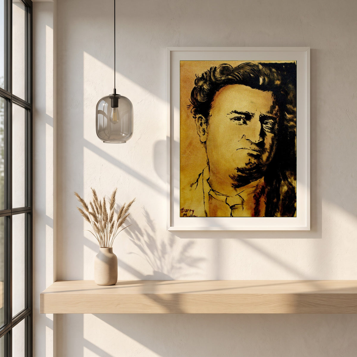 Brendan Behan framed print in a white frame on a plaster wall above an oak worktop in a bright Scandinavian kitchen