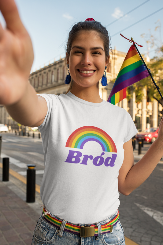 Vibrant rainbow t-shirt with 'Bród' in bold letters. 'Bród,' Irish meaning for 'Pride,' symbolises diversity and acceptance. Celebrate the LGBTQ+ community with this colorful shirt, reflecting a spectrum of identities and experiences. Wear it with pride.