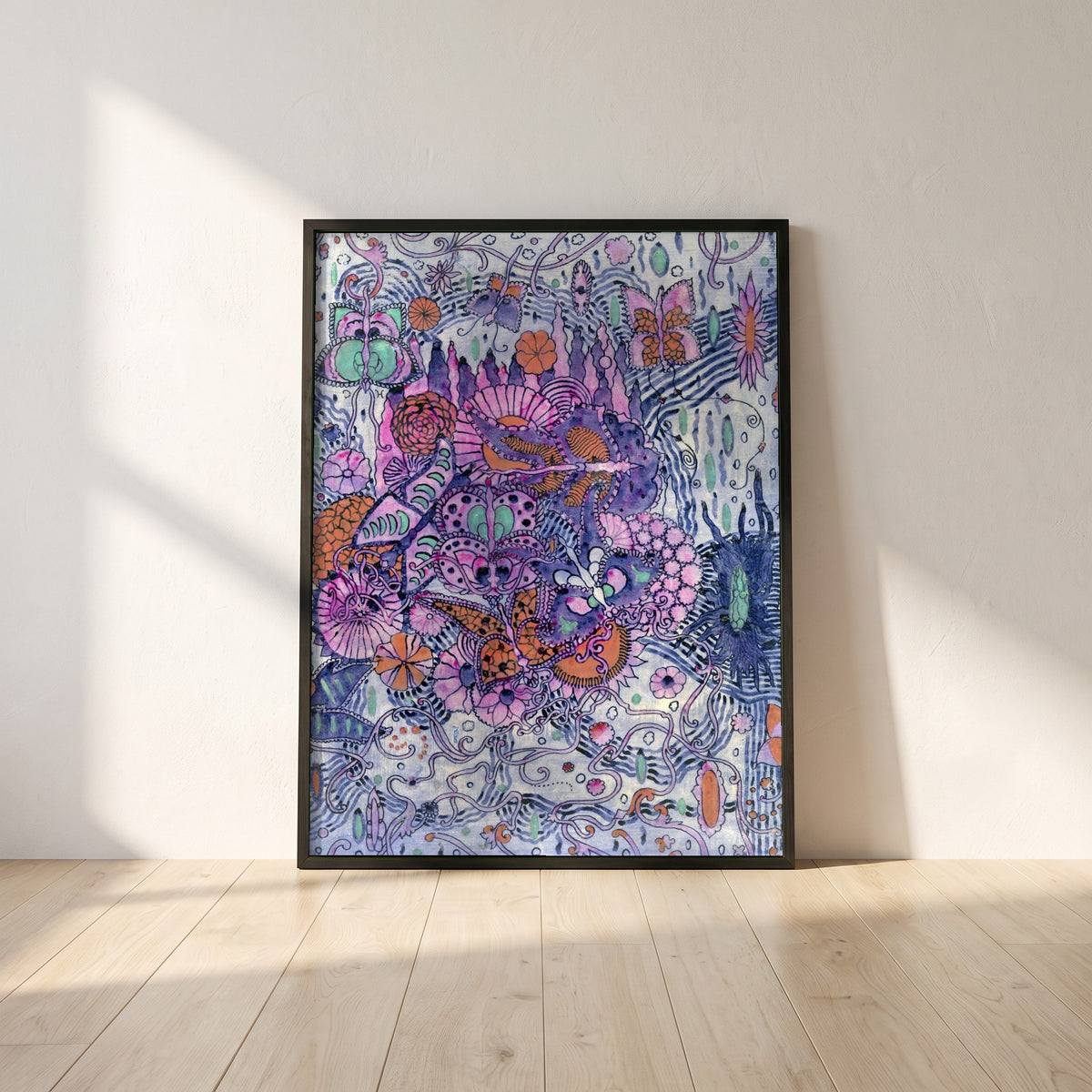Harry Clarke Butterfly Print | Sefton Fabrics Belfast 1918 framed print in a black frame leaning against a white plaster wall on oak floorboards in morning light