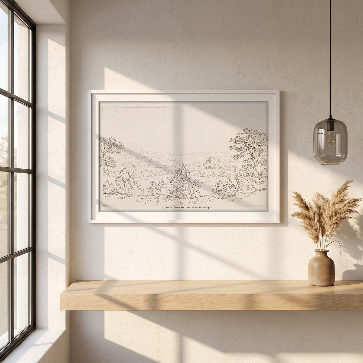 Chertsey, Surrey, from Botleys House framed print in a white frame on a plaster wall above an oak worktop in a bright Scandinavian kitchen