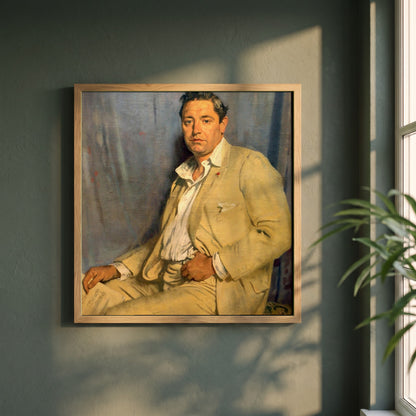 Count John McCormack framed print in a natural oak frame on a dark green wall beside a window, dappled plant shadow