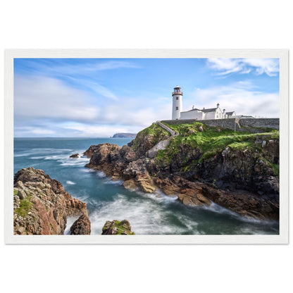 Capture the breathtaking beauty of Fanad Head Lighthouse in Co. Donegal, Ireland with our framed print. This captivating piece beautifully portrays the iconic landmark, offering a slice of Ireland's rugged coastal charm for your home decor.