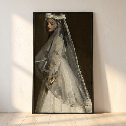 Eileen, Her First Communion framed print in a black frame leaning against a white plaster wall on oak floorboards in morning light