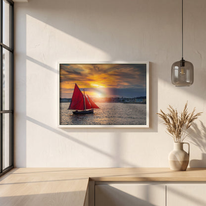 Galway Hooker framed print in a white frame on a plaster wall above an oak worktop in a bright Scandinavian kitchen