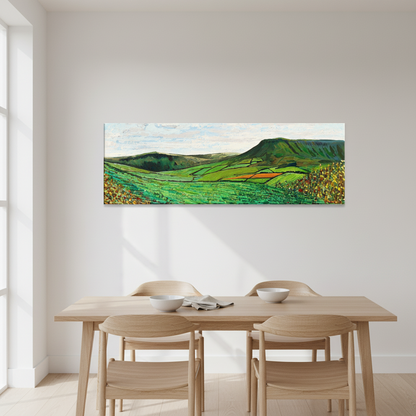 Green Glens of Antrim by Ó Maoláin panoramic canvas print on a white dining room wall above a light oak table