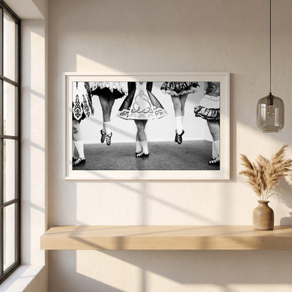 Irish Dancing Black & White framed print in a white frame on a plaster wall above an oak worktop in a bright Scandinavian kitchen
