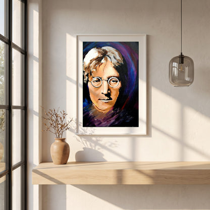 John Lennon Portrait framed print in a white frame on a plaster wall above an oak worktop in a bright Scandinavian kitchen