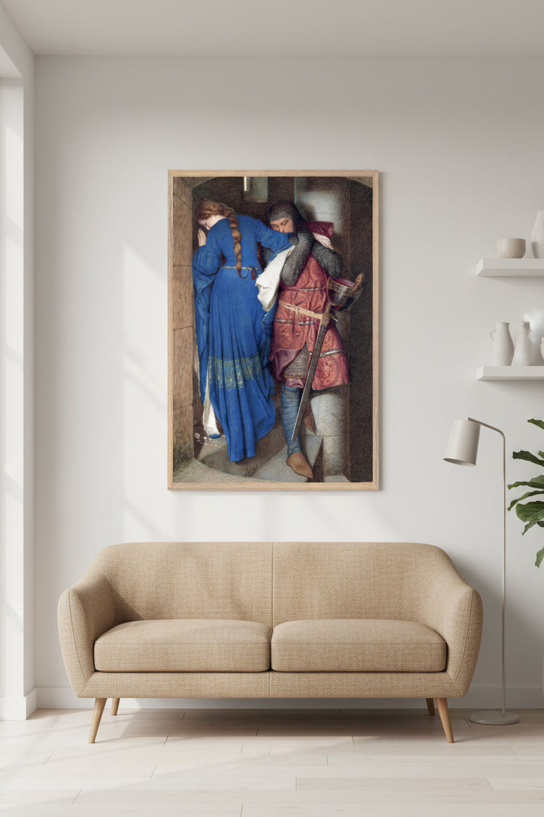 large framed art print of The Meeting on the Turret Stairs – Collector’s Edition Irish Art Print by Frederic William Burton in a natural oak frame, hanging above a low mid-century sofa in a bright Scandinavian living room, neutral walls, soft daylight, wooden floor, plants and simple ceramics, artwork colours vivid and accurate, Buy Irish Art