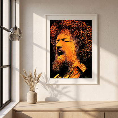 Luke Kelly framed print in a white frame on a plaster wall above an oak worktop in a bright Scandinavian kitchen