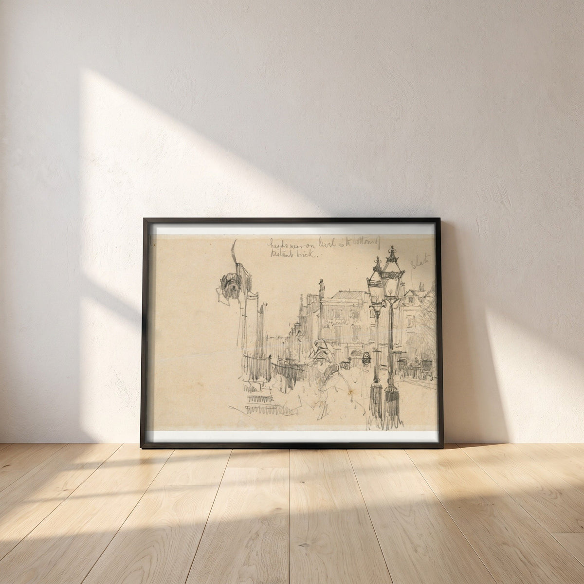 Merrion Row, Dublin, and Tracton House framed print in a black frame leaning against a white plaster wall on oak floorboards in morning light