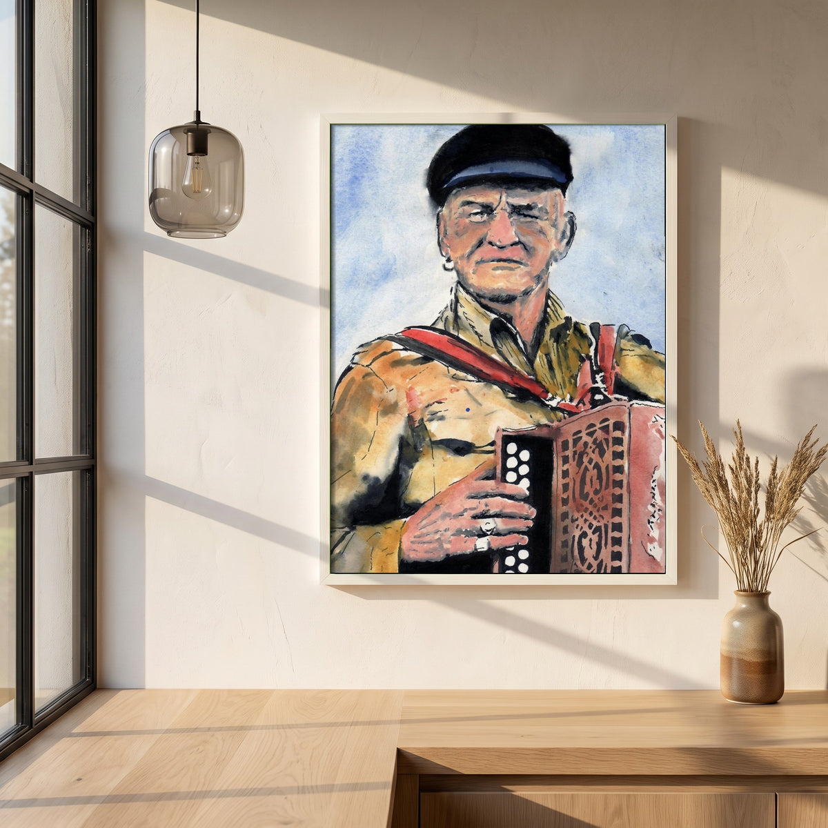 Patsy Dan Rogers Framed Art Print King of Tory Island framed print in a white frame on a plaster wall above an oak worktop in a bright Scandinavian kitchen