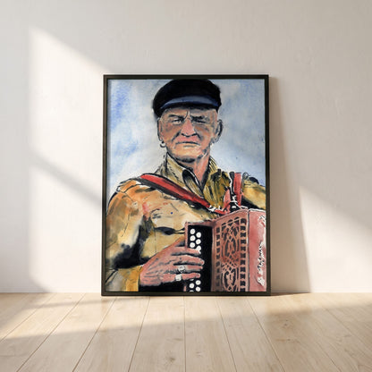 Patsy Dan Rogers Framed Art Print King of Tory Island framed print in a black frame leaning against a white plaster wall on oak floorboards in morning light