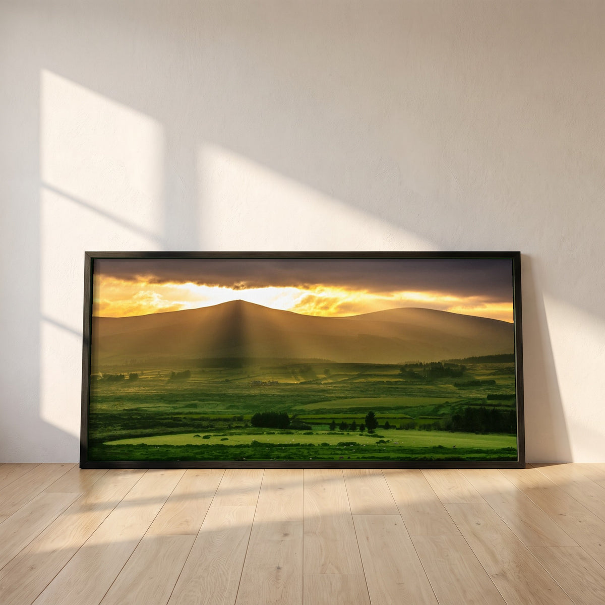 Sugarloaf Mountain, Wicklow framed print in a black frame leaning against a white plaster wall on oak floorboards in morning light