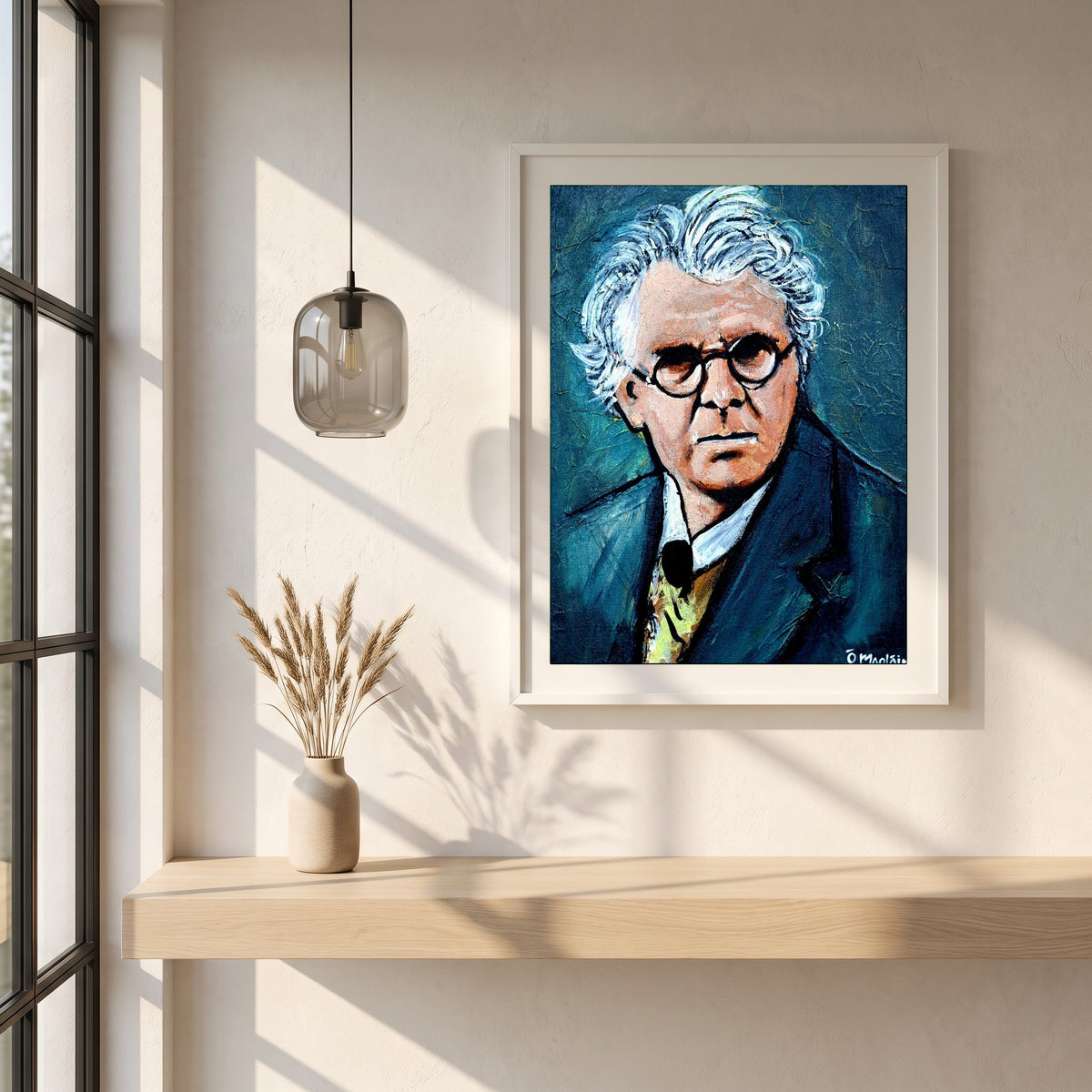 W.B. Yeats framed print in a white frame on a plaster wall above an oak worktop in a bright Scandinavian kitchen